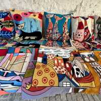 Colourful cat cushions in a Cyprus Market | Fiona Marshall