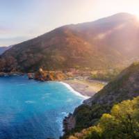 Enjoy a great meal at one of the seaside restaurants of Porto, Corsica | Hendrik Cornelissen