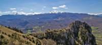 The ruins of chateau Roquefixade with the Pyrenees in the background | Jcb-caz-11