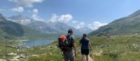 Hikers approaching Montespluga in the Italian Alps