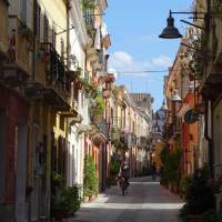 Sardinian street scene with a cyclist | 15070958