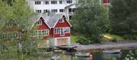 Heimly Pension and boathouses, Flam | John Millen