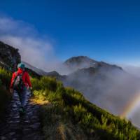 A hiker on her way to the summit of Pico Ruivo | Greg Snell