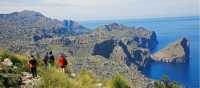 Hikers walking along Mallorca's coastal paths to Cala Codolar and El Murteret