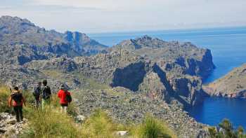 Hikers walking along Mallorca's coastal paths to Cala Codolar and El Murteret