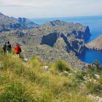 Hikers walking along Mallorca's coastal paths to Cala Codolar and El Murteret