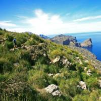 Hikers walking along Mallorca's coastal paths to Cala Codolar and El Murteret