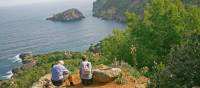 Hikers take in the views over the Mediterranean Sea