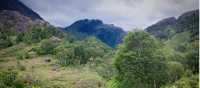The lush green countryside of Glen Nevis