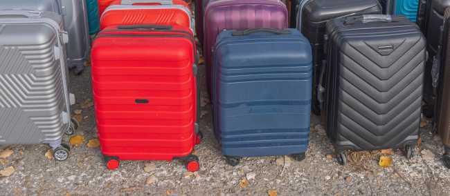 Suitcases being transferred, arriving at next accommodation.