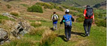Coast to Coast hikers descending into Borrowdale | John Millen